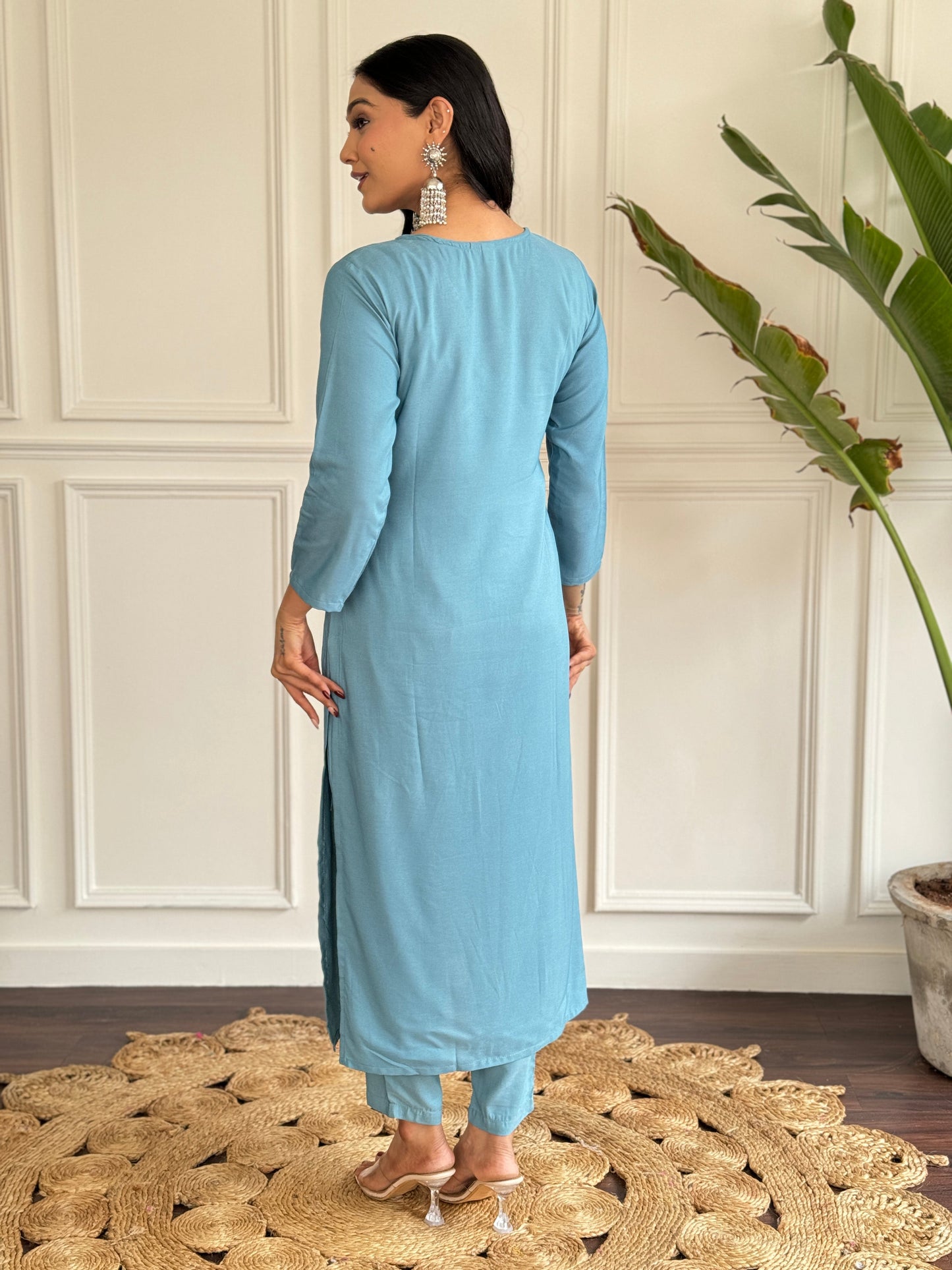 Exude elegance in this serene blue kurta set, adorned with delicate embroidery and a charming floral-print dupatta