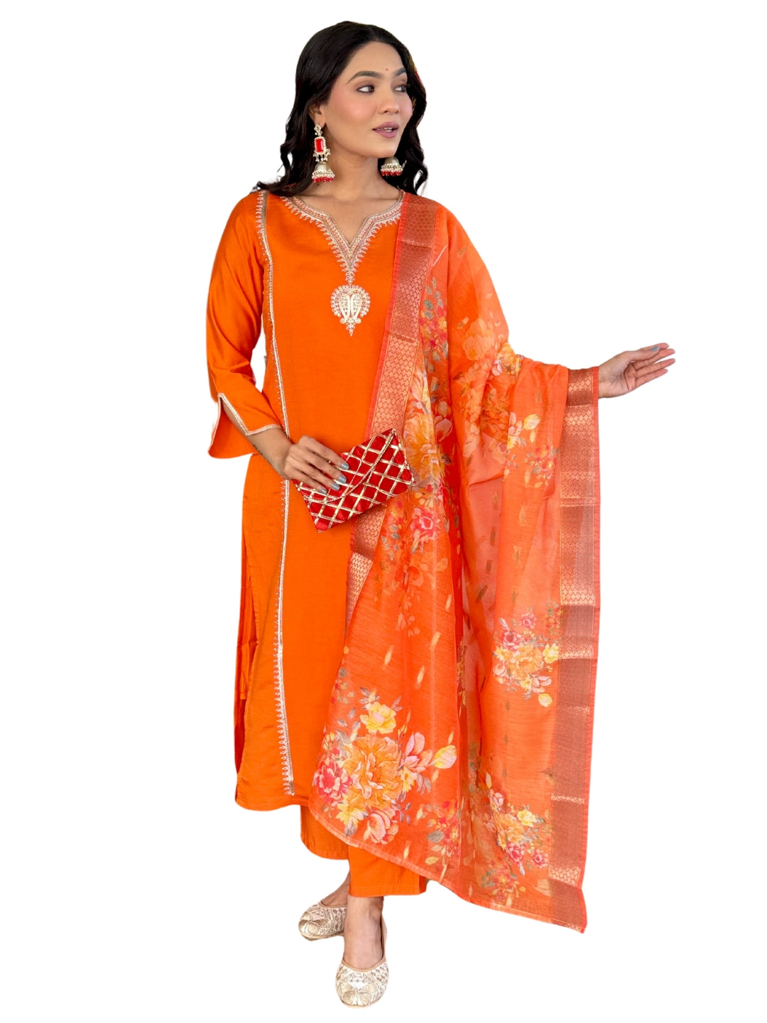 Radiate festive charm in this vibrant orange kurta set, adorned with delicate embroidery and a stunning floral dupatta