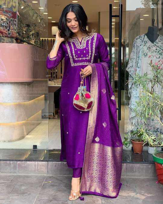 Radiate confidence in this stunning kurti set, adorned with delicate embroidery and paired with a rich, traditional dupatta.