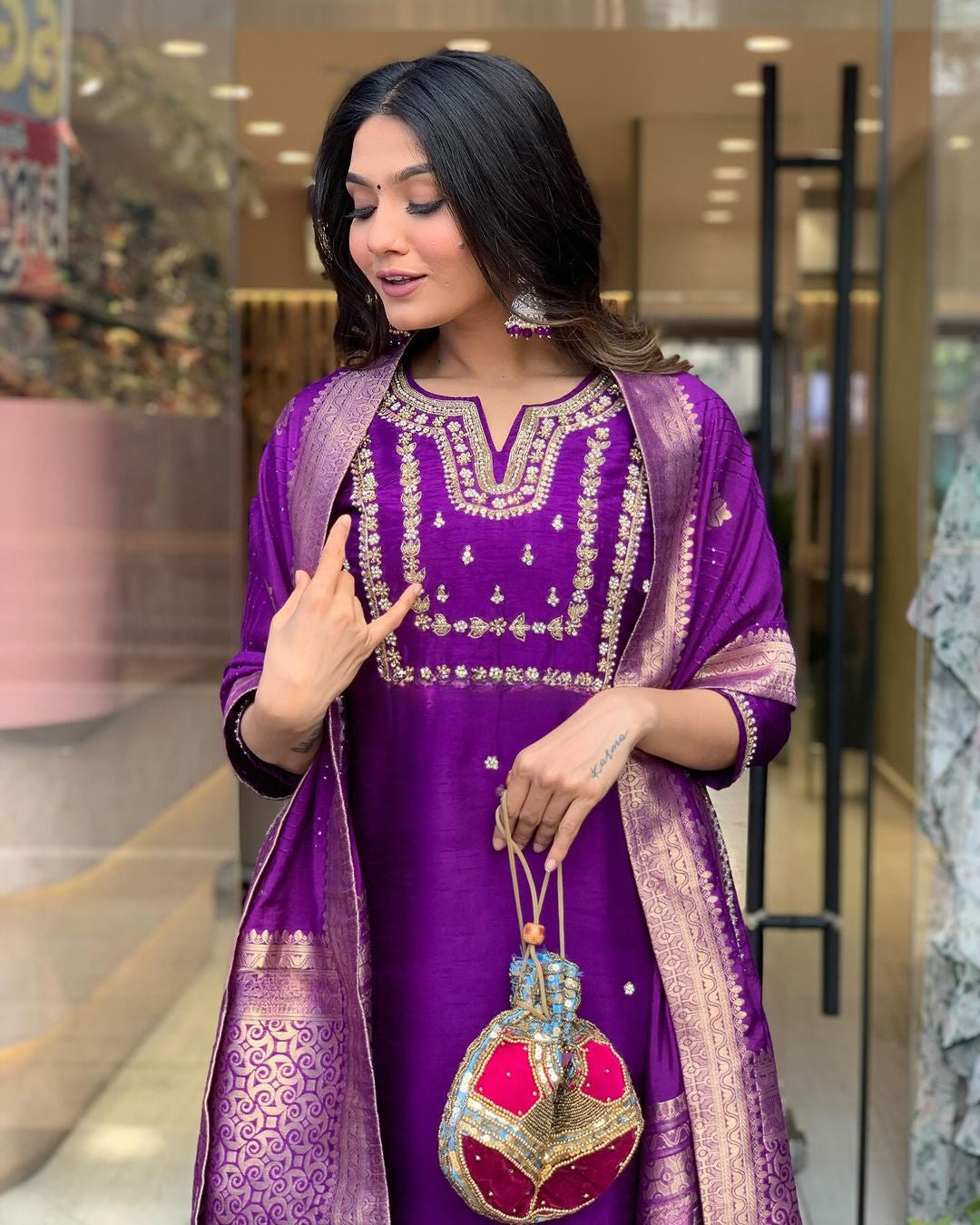 Radiate confidence in this stunning kurti set, adorned with delicate embroidery and paired with a rich, traditional dupatta.