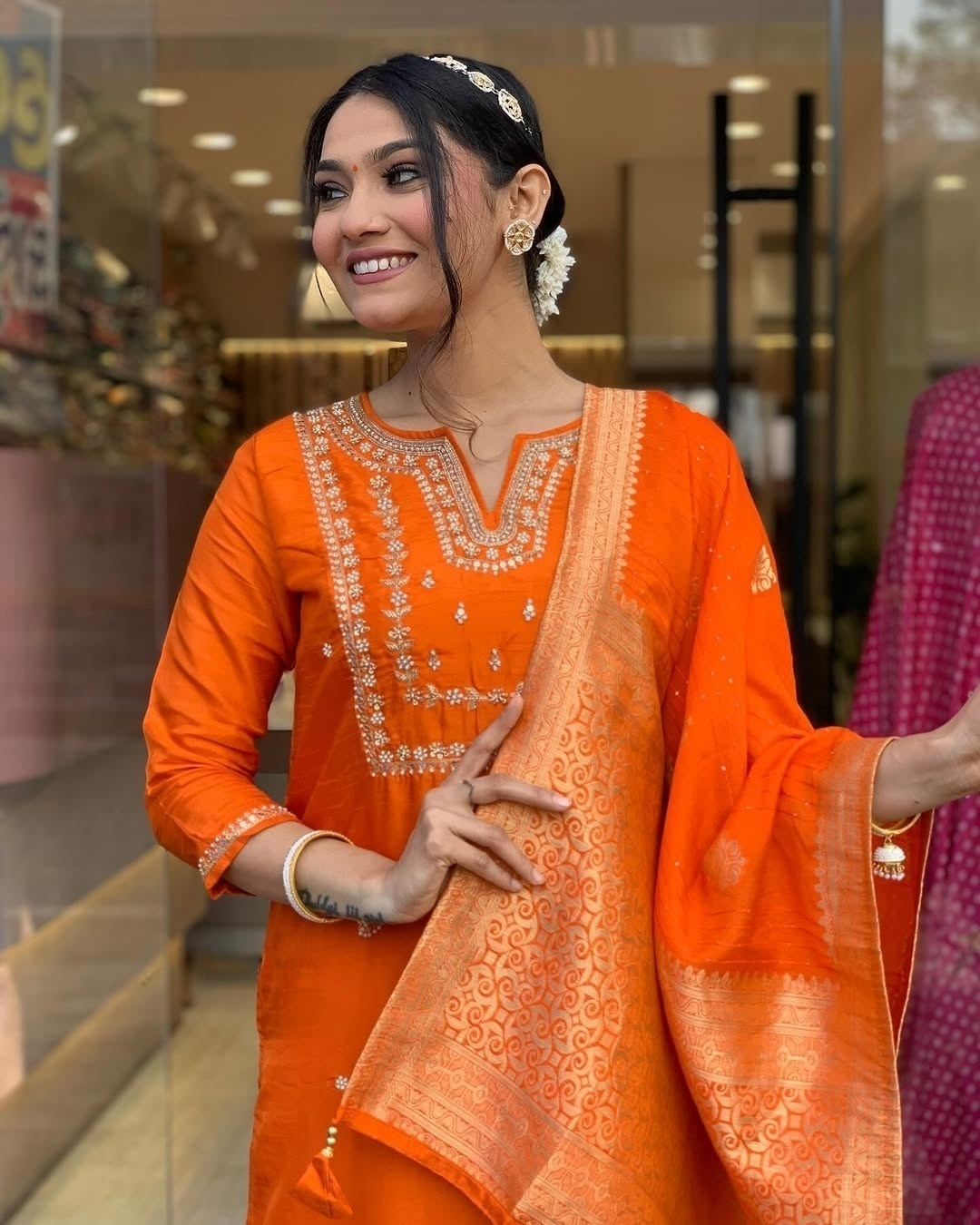 Radiate confidence in this stunning kurti set, adorned with delicate embroidery and paired with a rich, traditional dupatta.