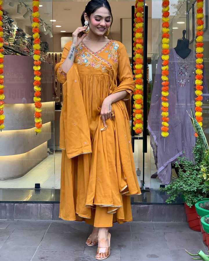 Elevate your ethnic wardrobe with this stunning mustard Anarkali kurta set