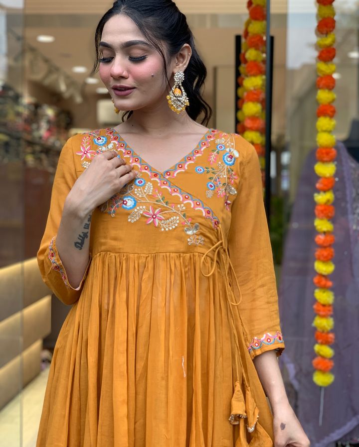 Elevate your ethnic wardrobe with this stunning mustard Anarkali kurta set