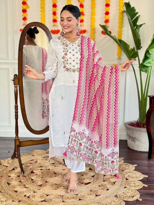 Elevate your style with this elegant white Kurti set, adorned with delicate mirror work and a vibrant pink zigzag dupatta