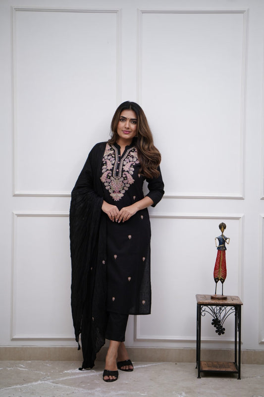 Make a bold statement with this classic black kurti set, featuring intricate pastel embroidery and a matching dupatta