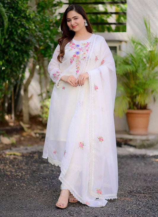 Radiate grace in this white floral embroidered kurti set, featuring delicate pastel blooms and a soft, flowy silhouette