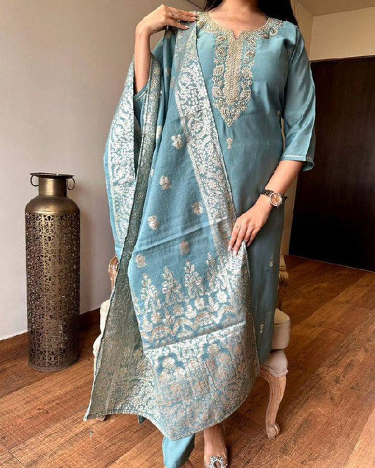 Embrace elegance with this pastel blue Kurti set, featuring exquisite embroidery and a delicately adorned dupatta