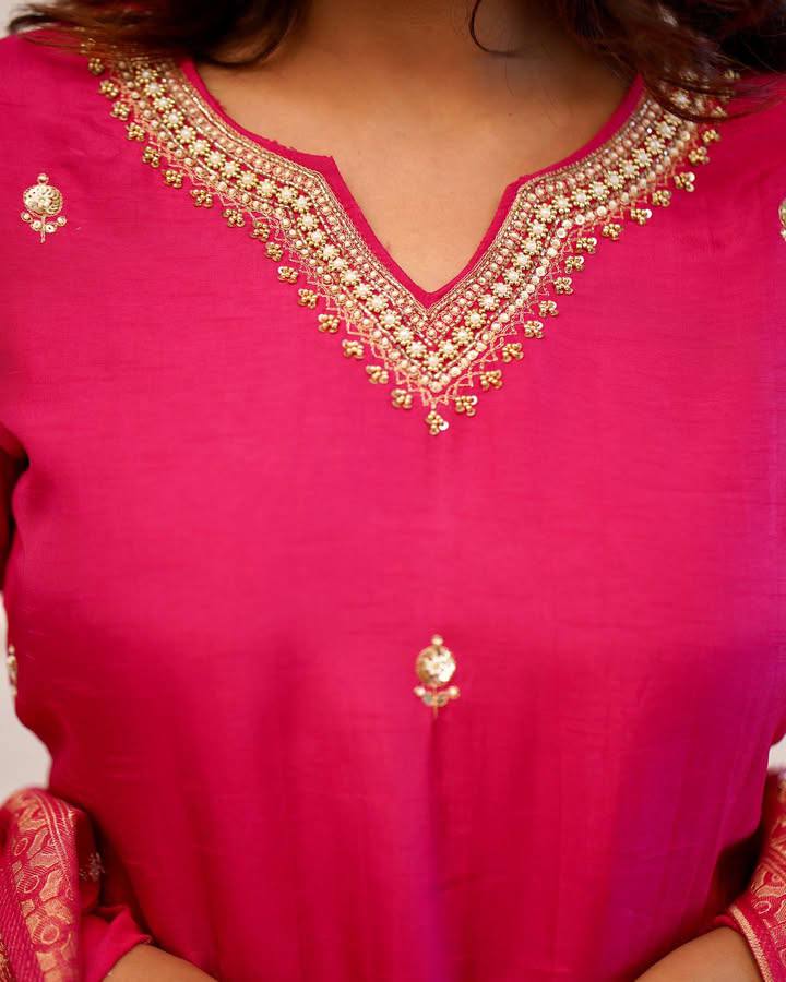 Embrace elegance in this exquisite pink kurti set, featuring intricate embroidery, a luxurious dupatta with gold detailing, and a timeless silhouette