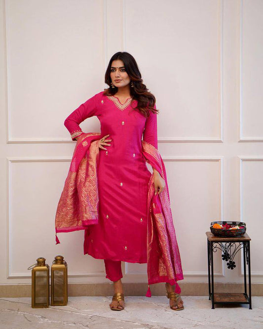 Embrace elegance in this exquisite pink kurti set, featuring intricate embroidery, a luxurious dupatta with gold detailing, and a timeless silhouette