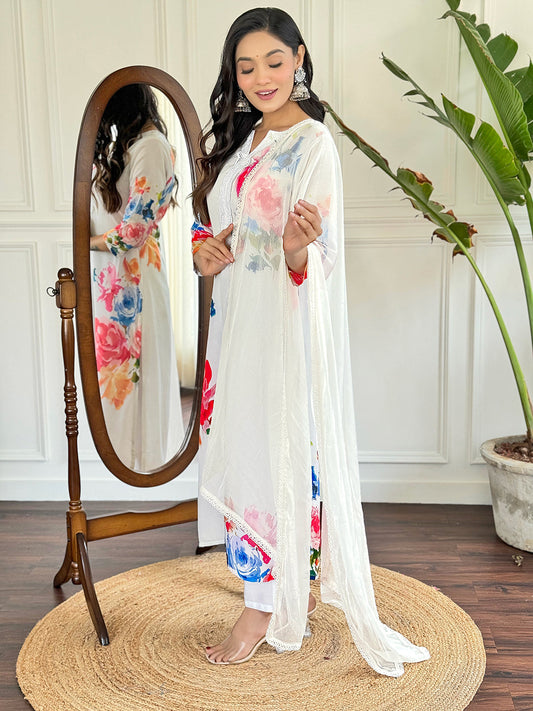 Radiate grace in this stunning white floral Kurti set, adorned with vibrant blossoms and a delicate lace neckline