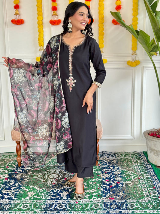 Step into elegance with this stunning black Kurti set, featuring intricate embroidery and a floral chiffon dupatta