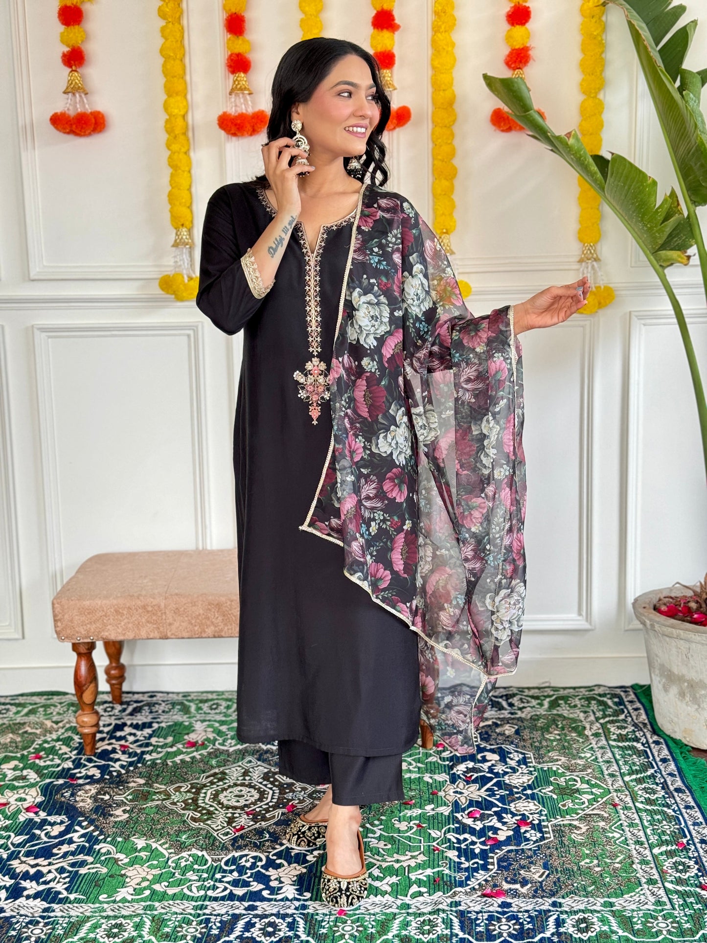 Step into elegance with this stunning black Kurti set, featuring intricate embroidery and a floral chiffon dupatta