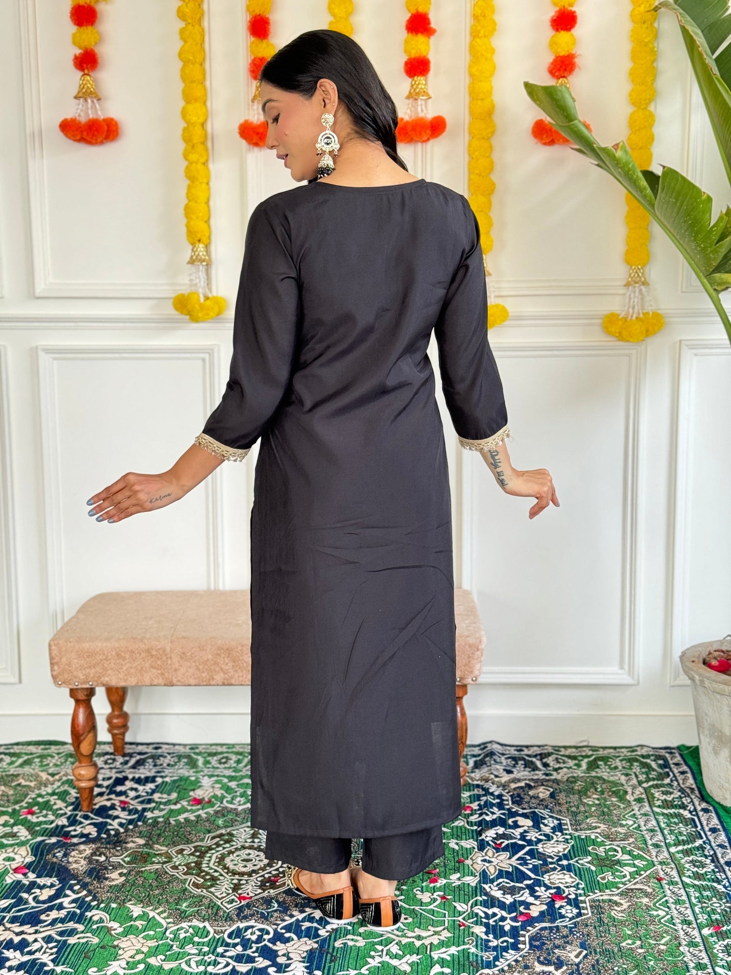 Step into elegance with this stunning black Kurti set, featuring intricate embroidery and a floral chiffon dupatta