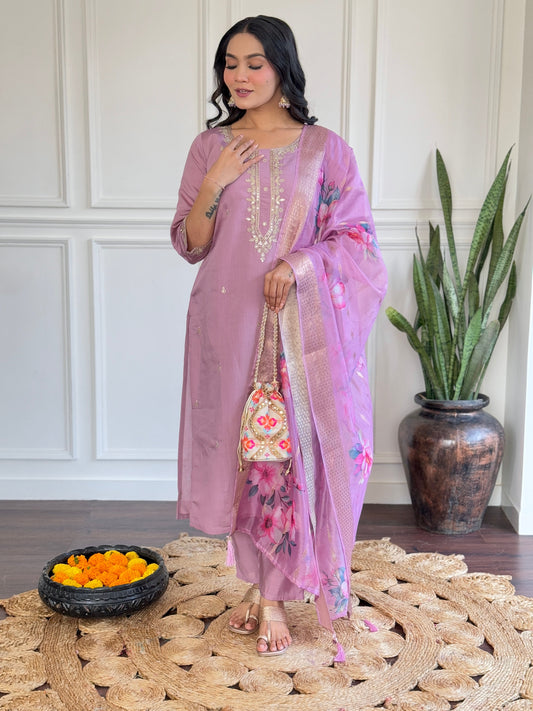 Embrace elegance with this pastel lavender Kurti set, adorned with delicate embroidery and a floral-printed dupatta