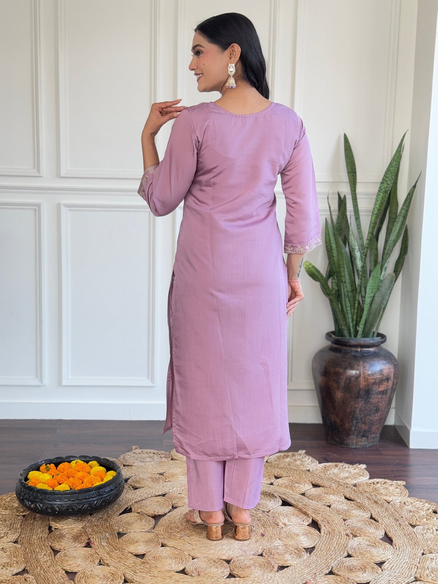 Embrace elegance with this pastel lavender Kurti set, adorned with delicate embroidery and a floral-printed dupatta
