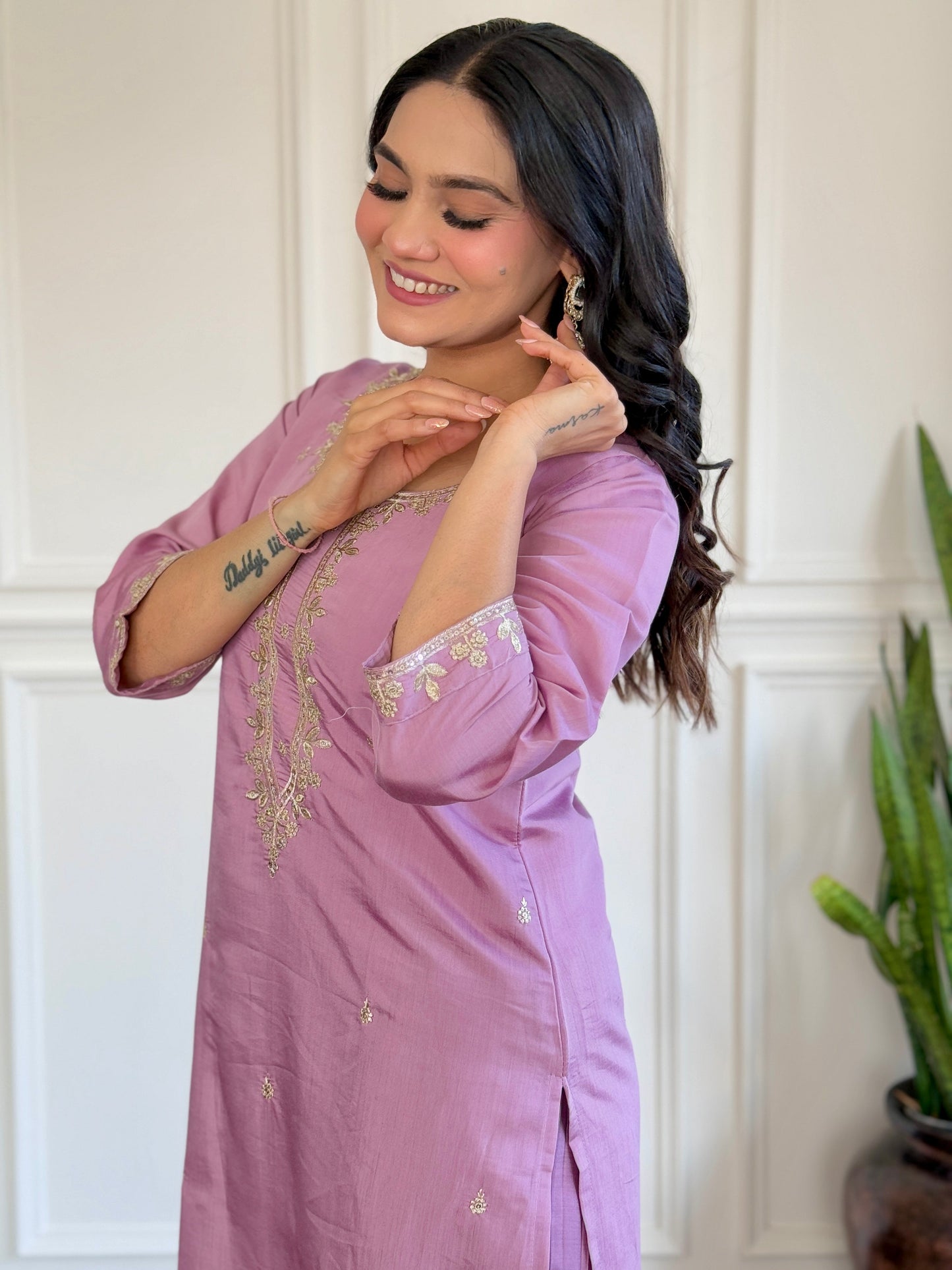 Embrace elegance with this pastel lavender Kurti set, adorned with delicate embroidery and a floral-printed dupatta