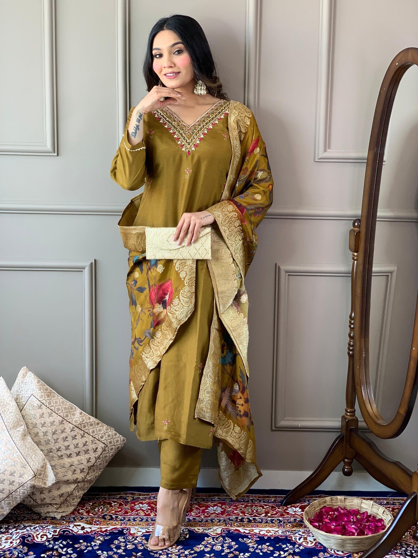 Grace meets tradition in this stunning olive-green Kurti set, adorned with delicate embroidery and a richly printed dupatta