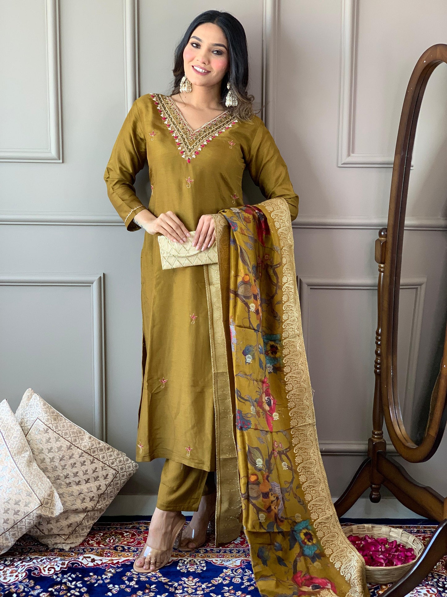 Grace meets tradition in this stunning olive-green Kurti set, adorned with delicate embroidery and a richly printed dupatta