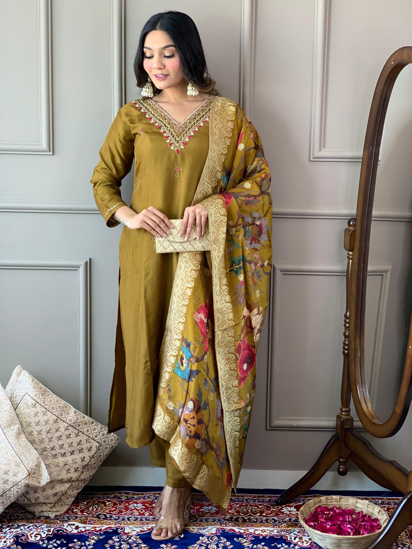 Grace meets tradition in this stunning olive-green Kurti set, adorned with delicate embroidery and a richly printed dupatta