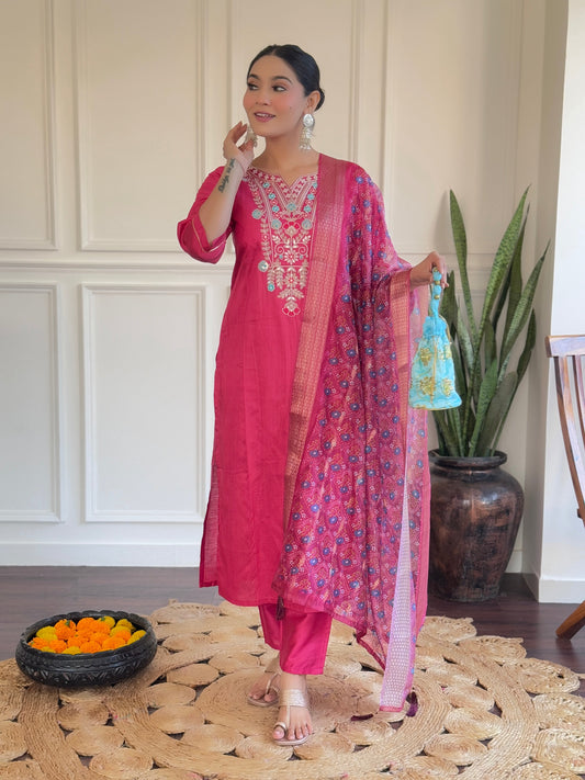 Make a bold statement with this vibrant pink Kurti set, adorned with intricate embroidery and a beautifully detailed dupatta