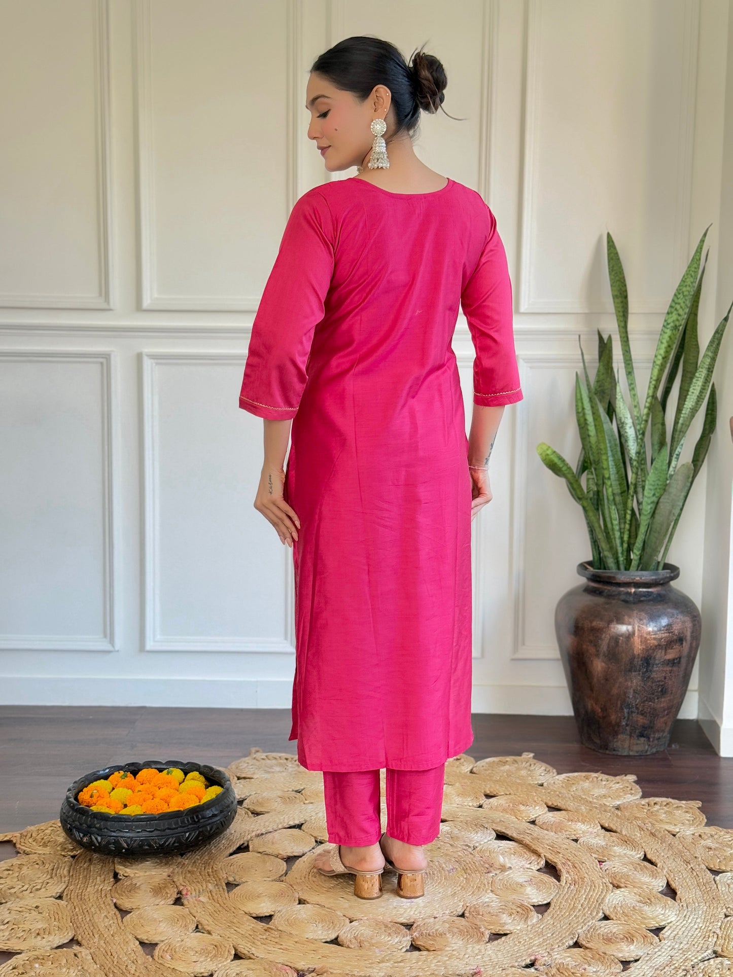Make a bold statement with this vibrant pink Kurti set, adorned with intricate embroidery and a beautifully detailed dupatta