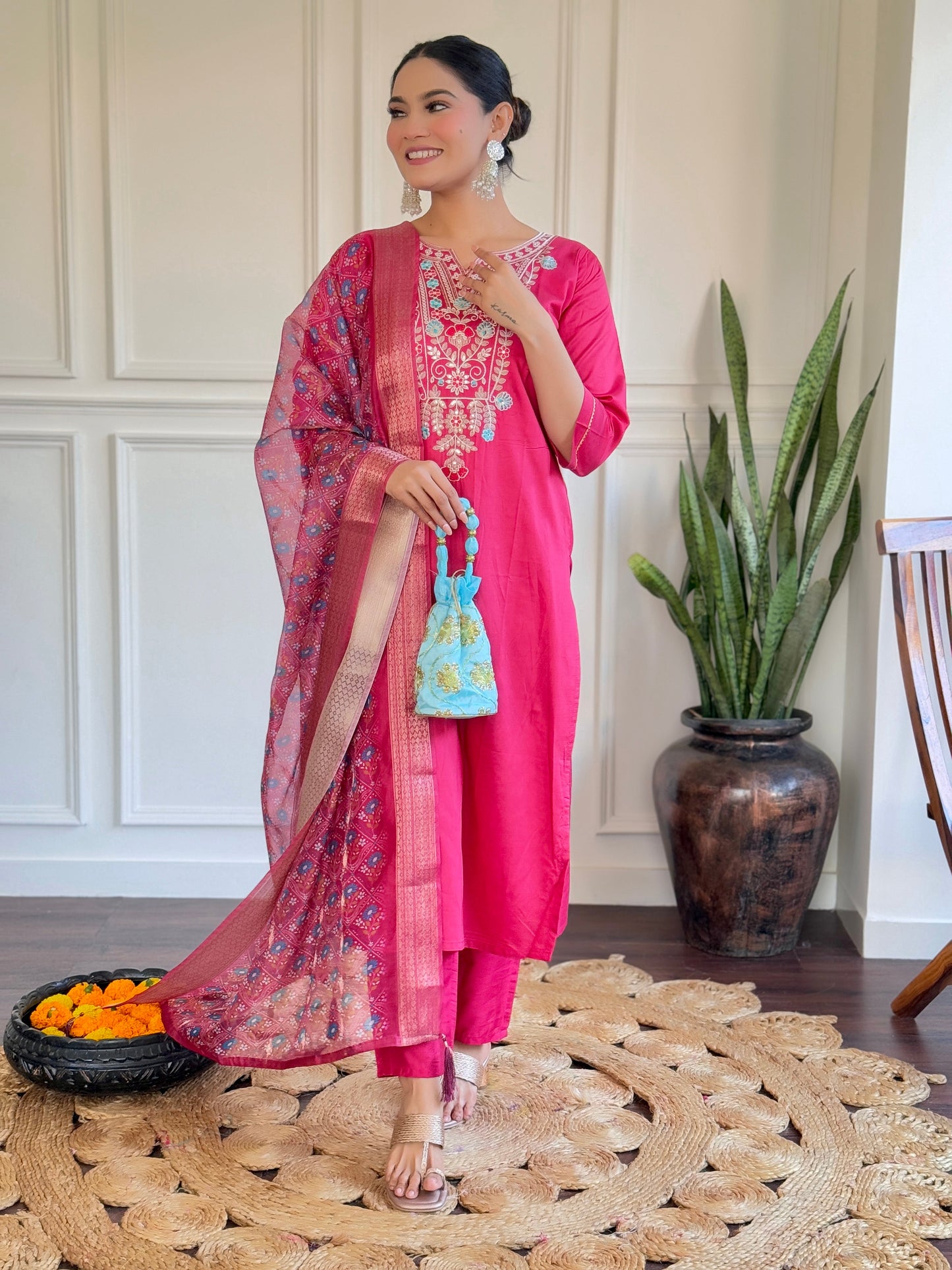 Make a bold statement with this vibrant pink Kurti set, adorned with intricate embroidery and a beautifully detailed dupatta
