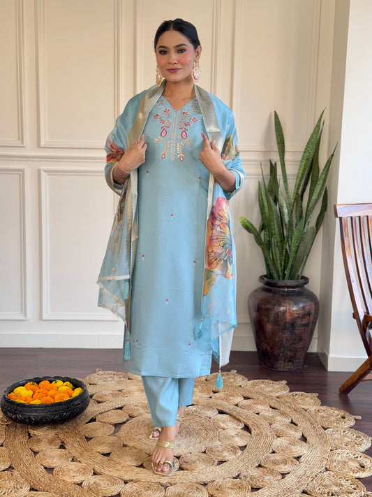 Step into elegance with this pastel blue Kurti set, featuring delicate embroidery and a beautifully printed dupatta
