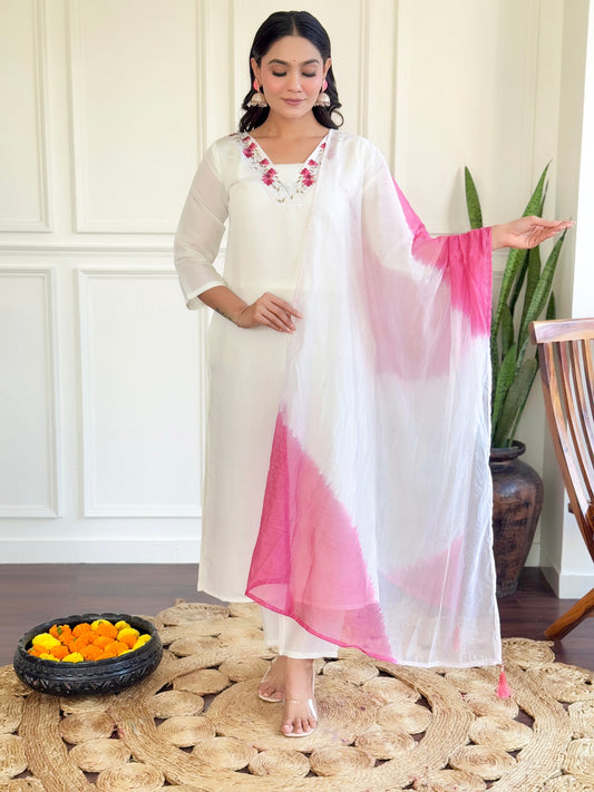 Grace meets elegance in this stunning white Kurti set, adorned with delicate floral embroidery and a soft pink ombre dupatta