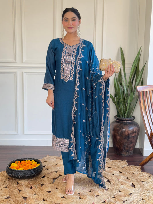 Step into elegance with this deep blue Kurti set, featuring exquisite embroidery and a delicately adorned dupatta