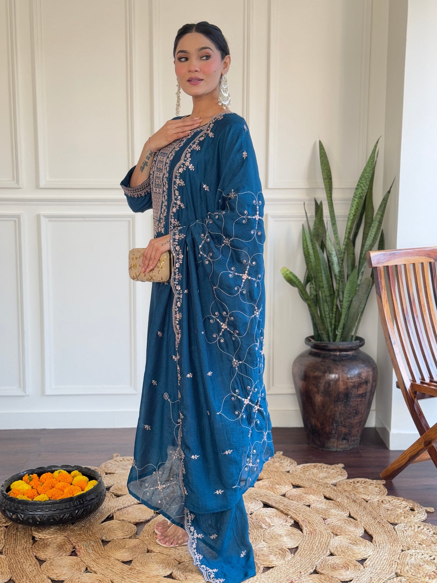 Step into elegance with this deep blue Kurti set, featuring exquisite embroidery and a delicately adorned dupatta