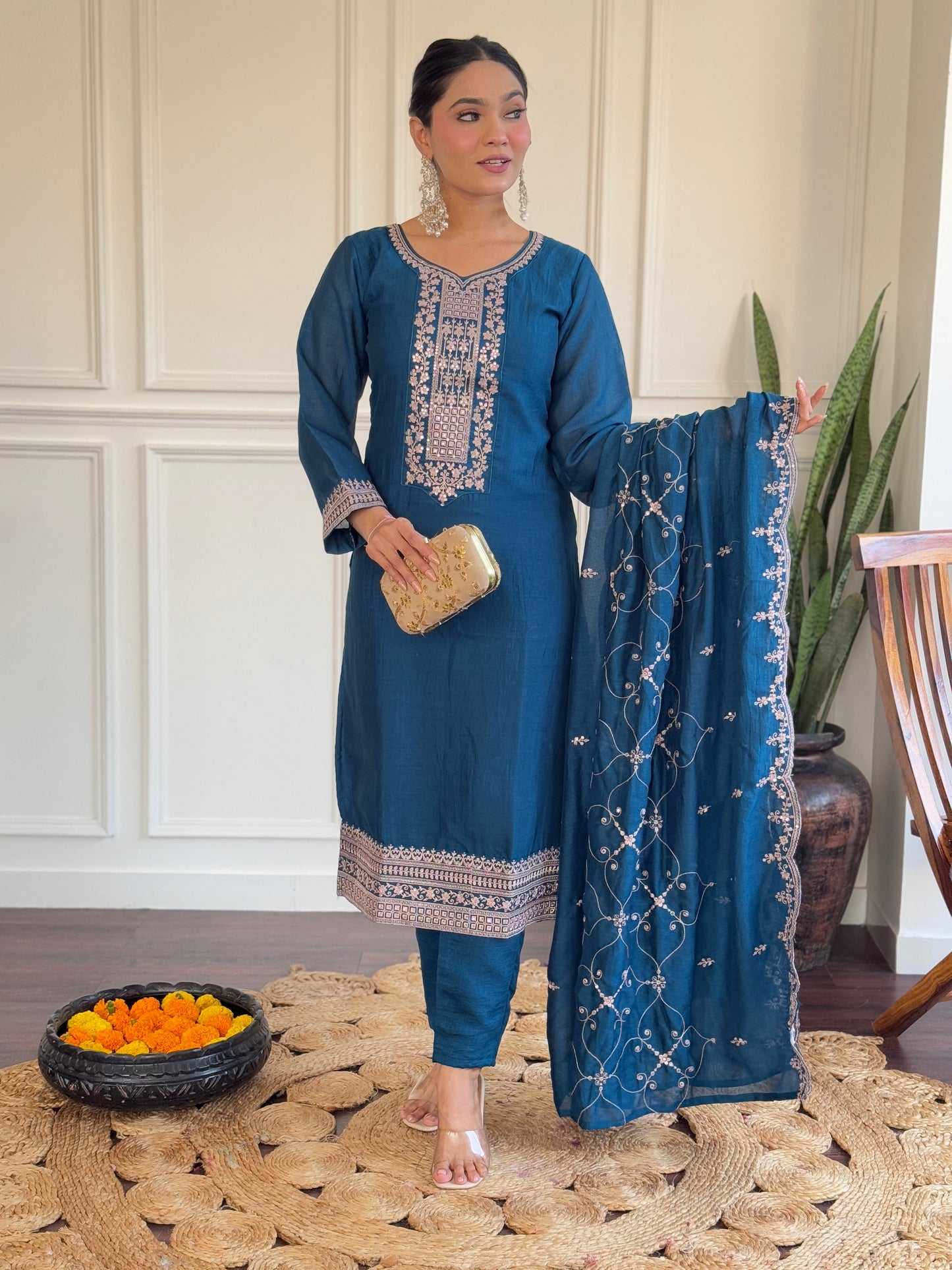 Step into elegance with this deep blue Kurti set, featuring exquisite embroidery and a delicately adorned dupatta