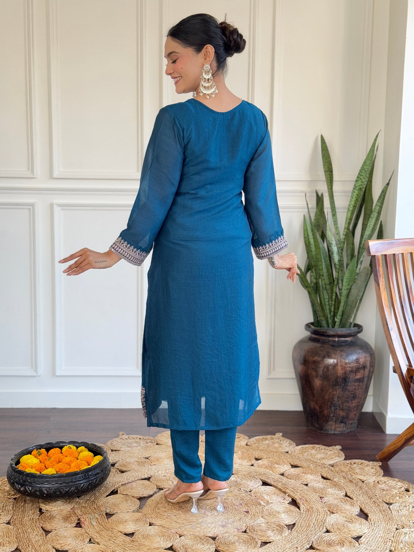 Step into elegance with this deep blue Kurti set, featuring exquisite embroidery and a delicately adorned dupatta