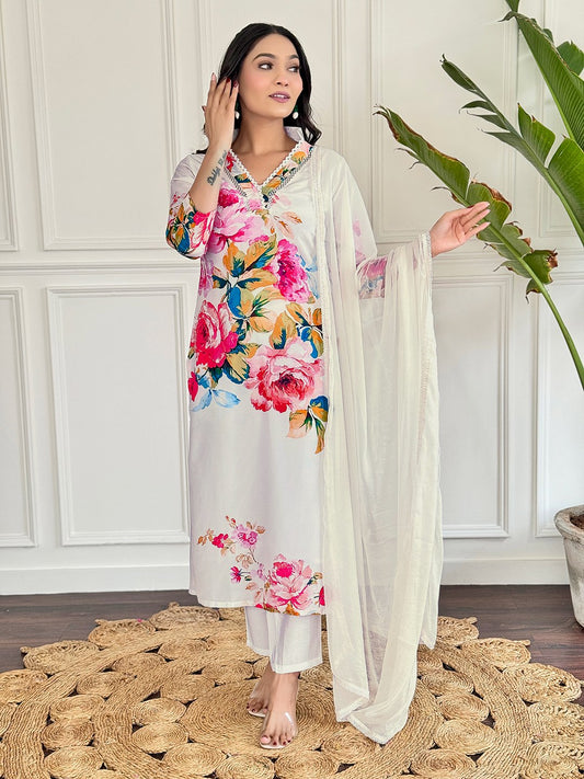 "Embrace elegance with this stunning white floral Kurti set, featuring vibrant blooms and delicate embroidery