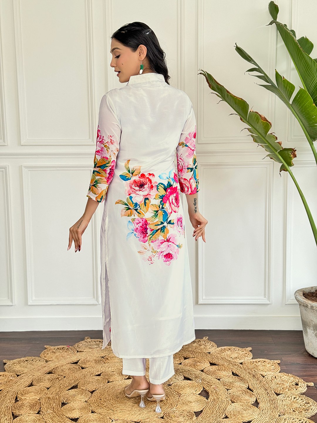 "Embrace elegance with this stunning white floral Kurti set, featuring vibrant blooms and delicate embroidery