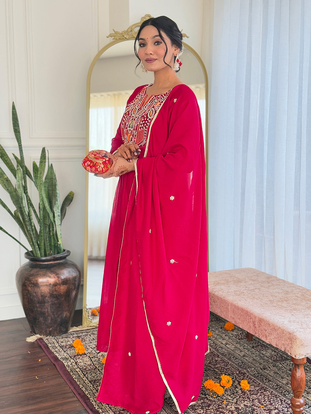 Make a statement with this stunning red kurti set, featuring intricate embroidery and a flowy silhouette for timeless elegance
