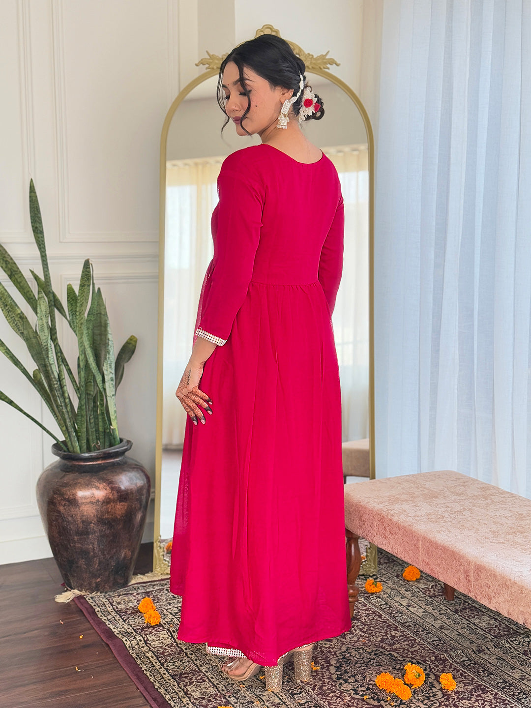 Make a statement with this stunning red kurti set, featuring intricate embroidery and a flowy silhouette for timeless elegance