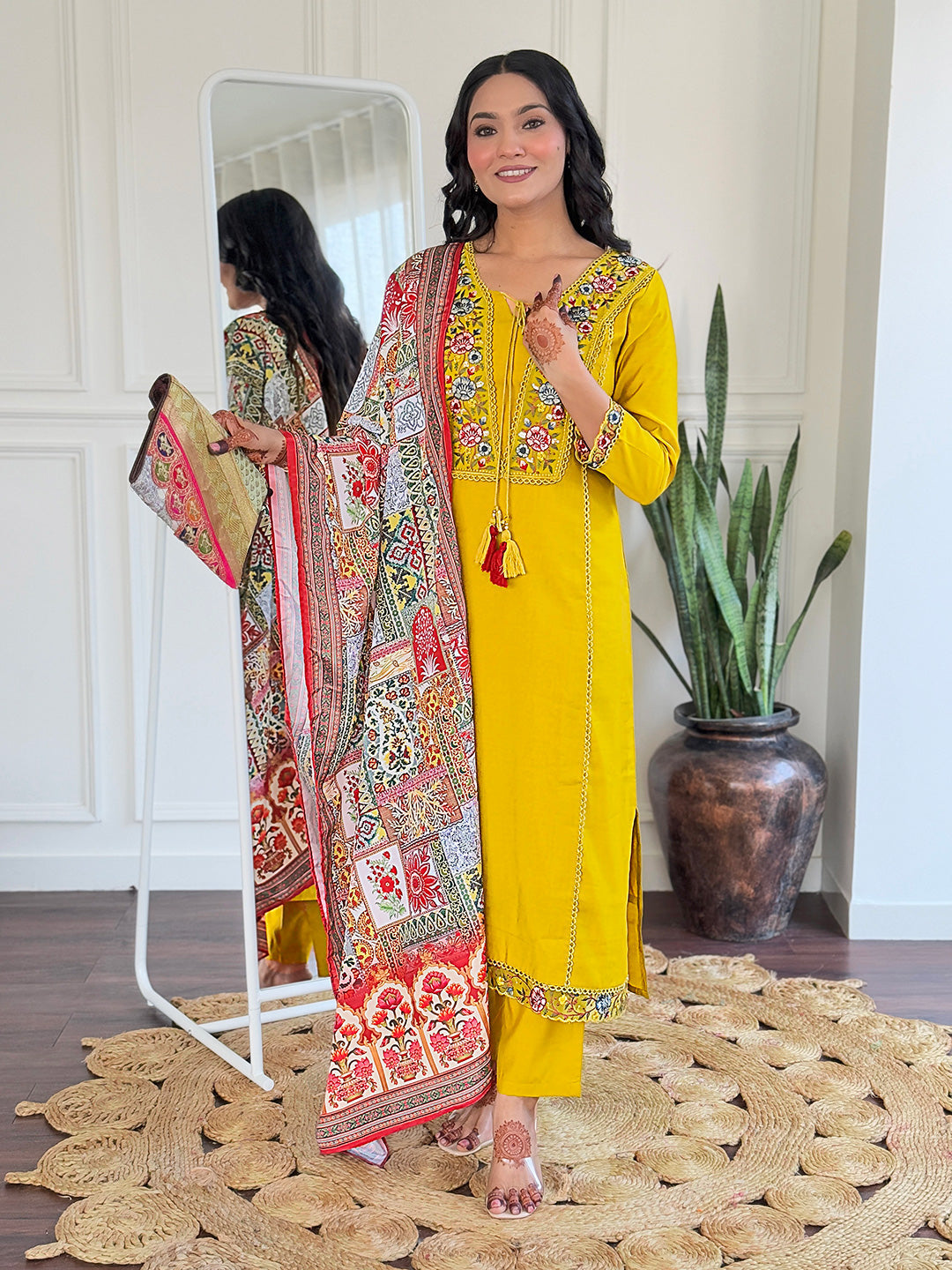 Brighten up your wardrobe with this stunning mustard yellow kurti set, featuring intricate multicolor embroidery and a beautifully detailed dupatta.