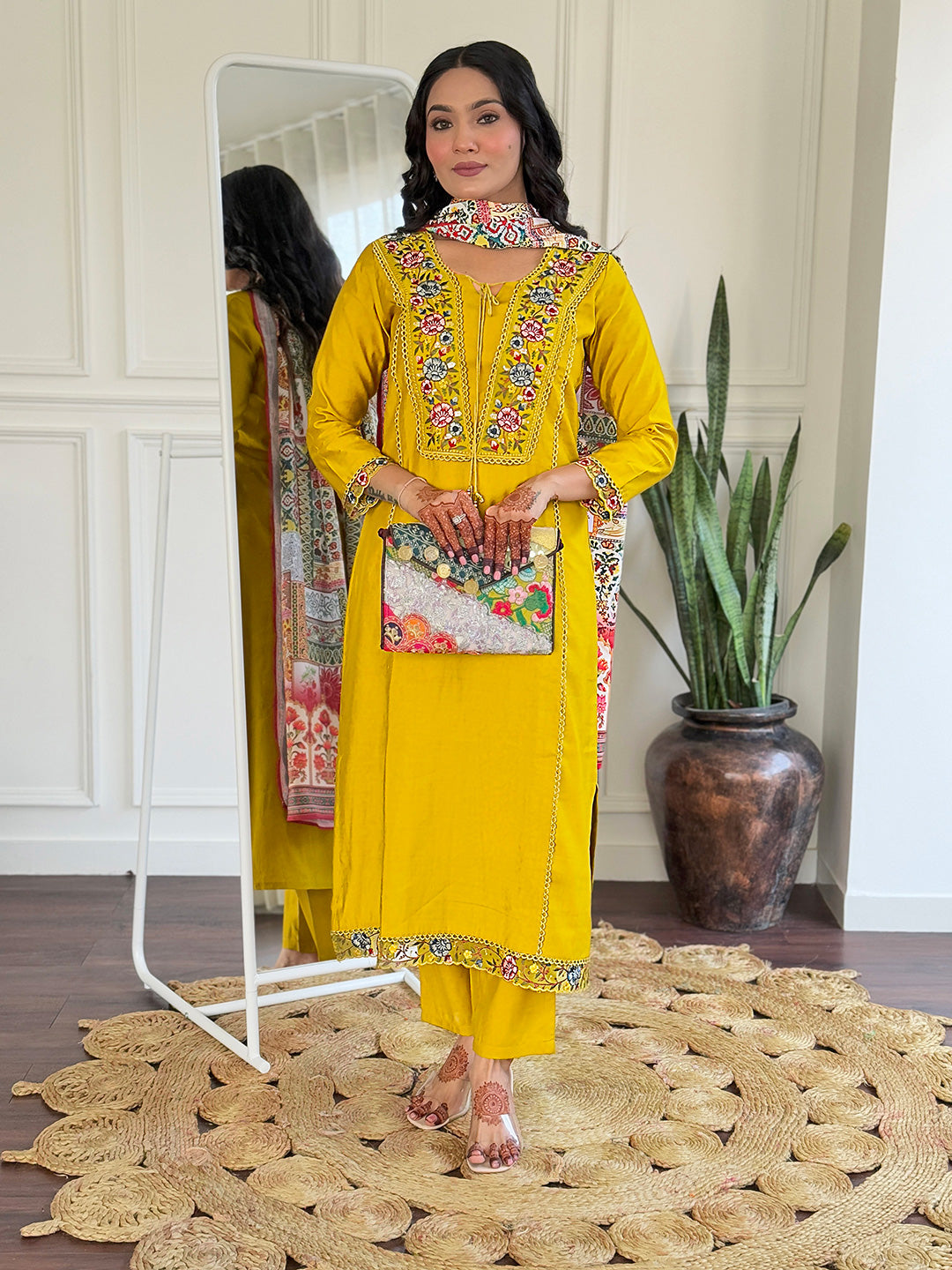 Brighten up your wardrobe with this stunning mustard yellow kurti set, featuring intricate multicolor embroidery and a beautifully detailed dupatta.