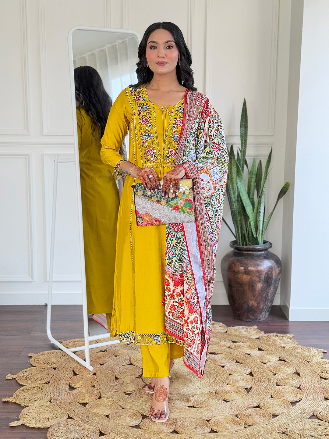 Brighten up your wardrobe with this stunning mustard yellow kurti set, featuring intricate multicolor embroidery and a beautifully detailed dupatta.