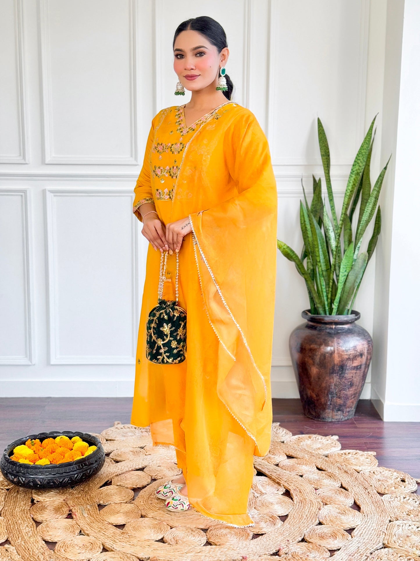 Brighten up your wardrobe with this stunning yellow kurti set, adorned with intricate floral embroidery and a graceful dupatt