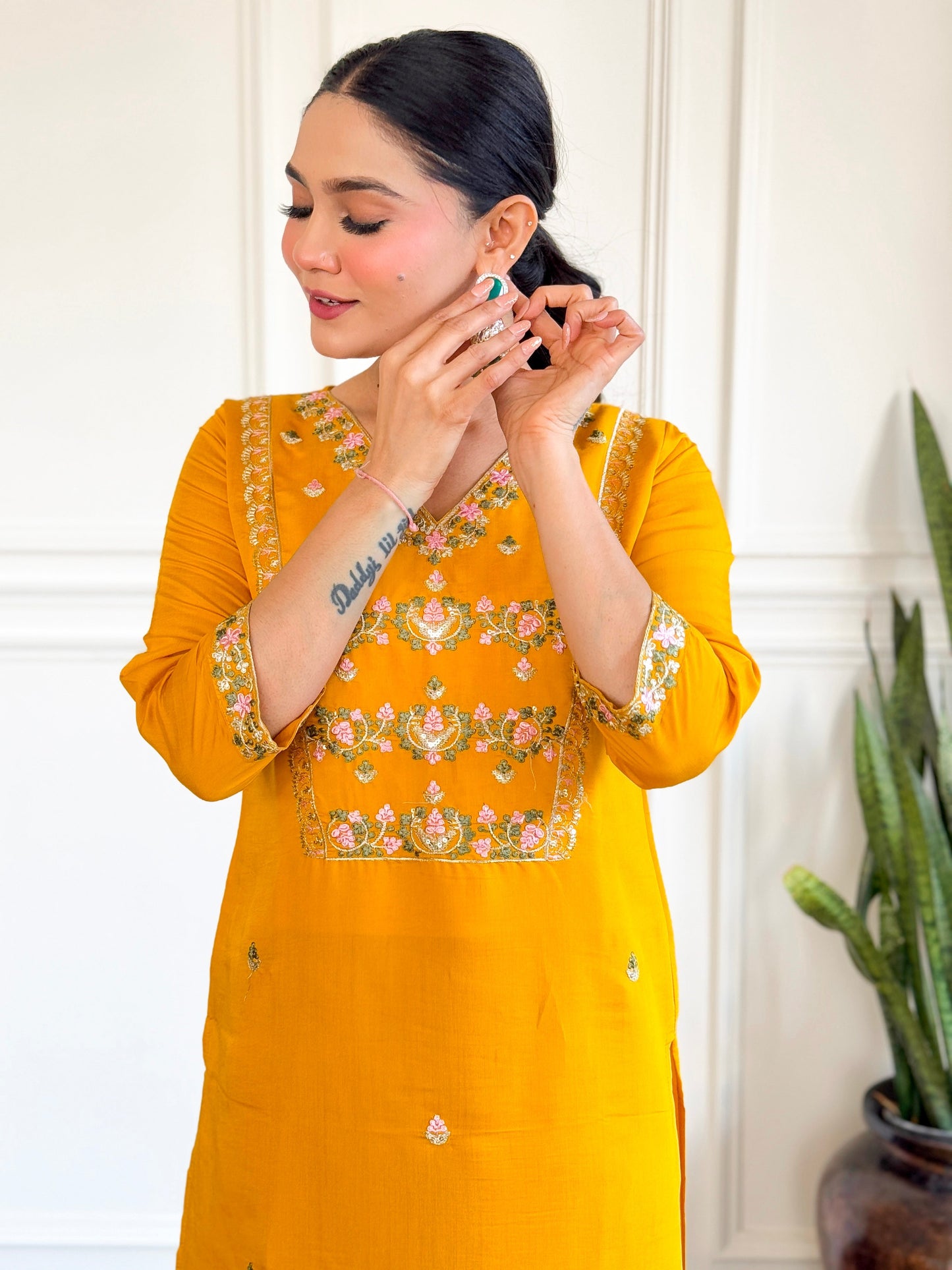 Brighten up your wardrobe with this stunning yellow kurti set, adorned with intricate floral embroidery and a graceful dupatt