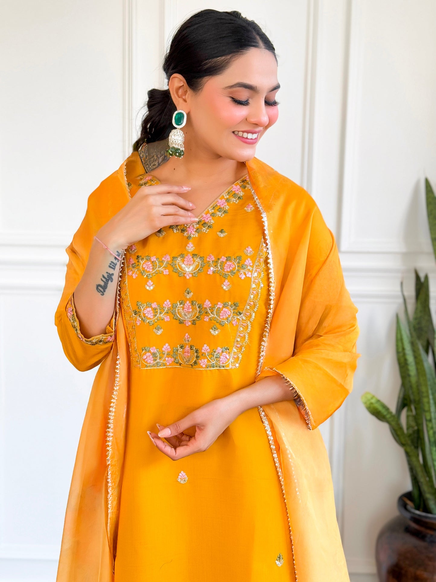 Brighten up your wardrobe with this stunning yellow kurti set, adorned with intricate floral embroidery and a graceful dupatt