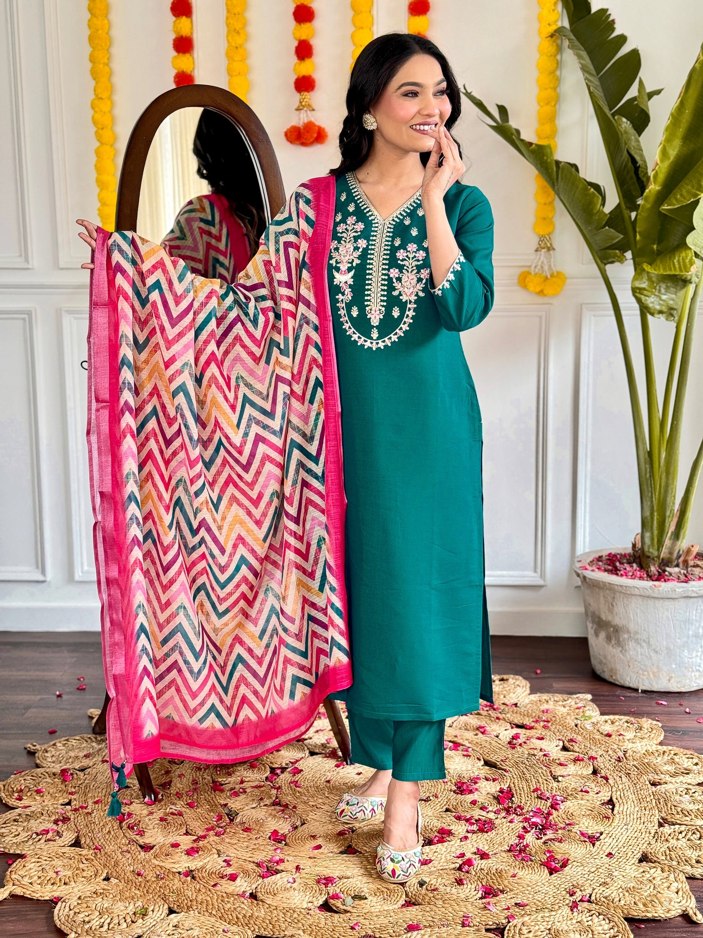 Add a pop of elegance to your wardrobe with this vibrant green kurti set. Featuring delicate floral embroidery
