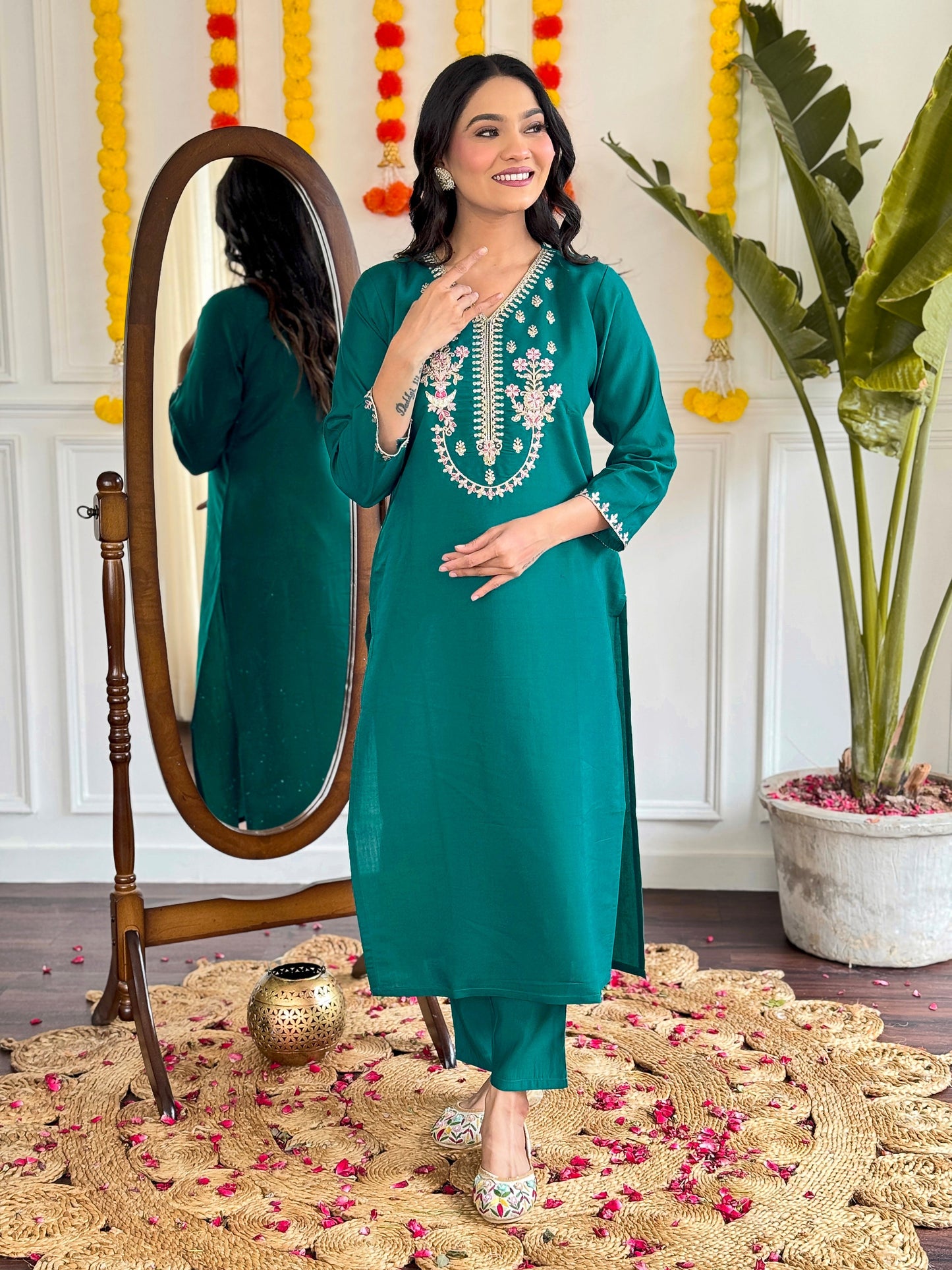 Add a pop of elegance to your wardrobe with this vibrant green kurti set. Featuring delicate floral embroidery