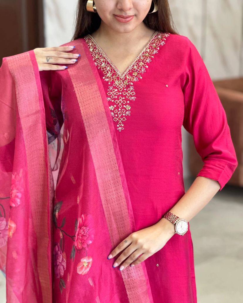 This stunning pink kurti set features elegant embroidery on the neckline and a floral-printed dupatta for a graceful touch