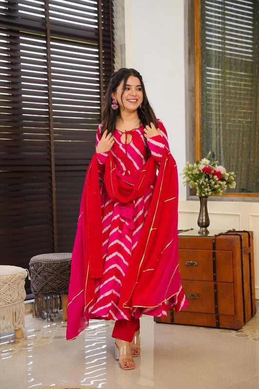 Radiate charm in this stunning pink tie-dye kurti set, featuring a flowy silhouette, delicate keyhole neckline, and a complementing dupatta