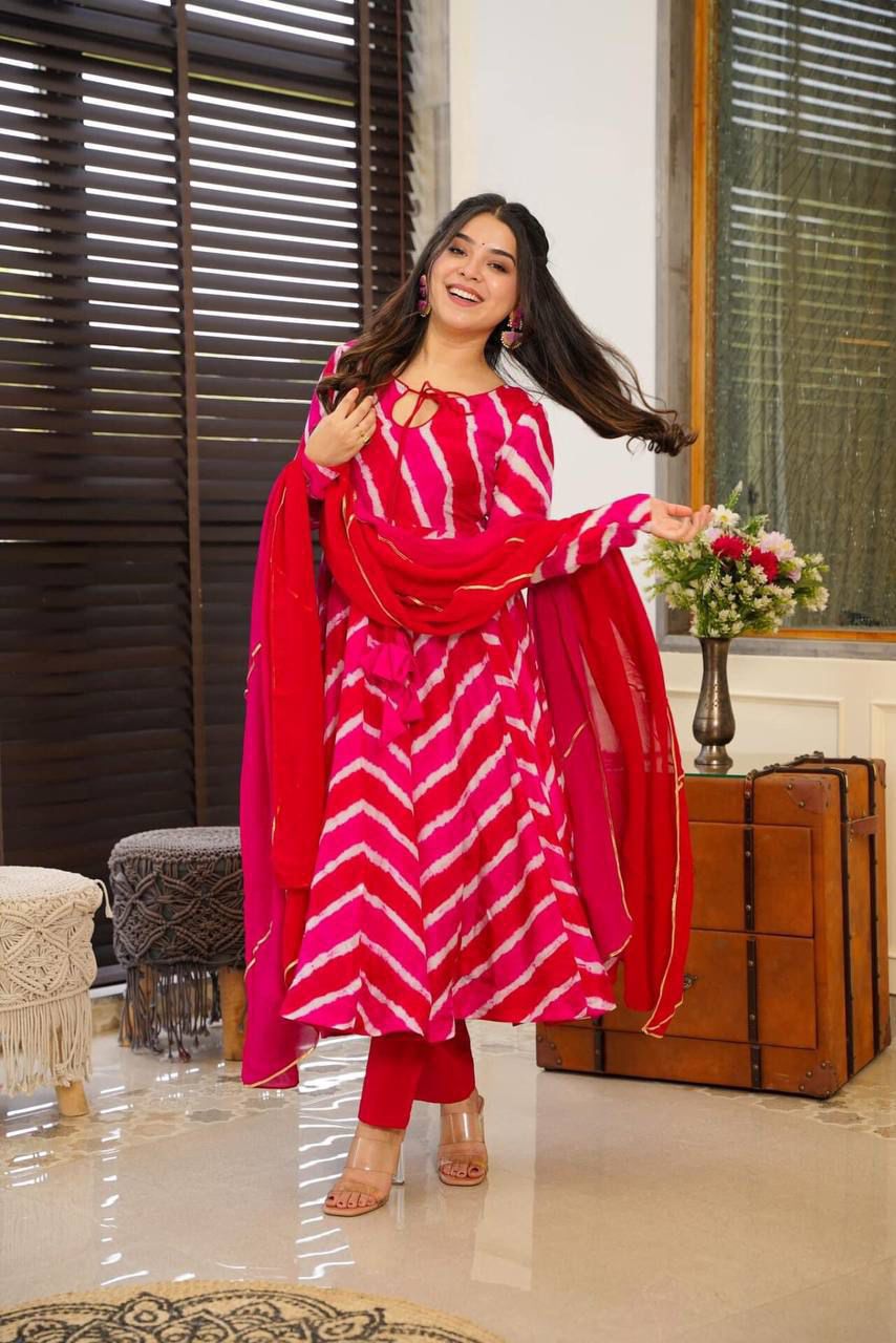 Radiate charm in this stunning pink tie-dye kurti set, featuring a flowy silhouette, delicate keyhole neckline, and a complementing dupatta
