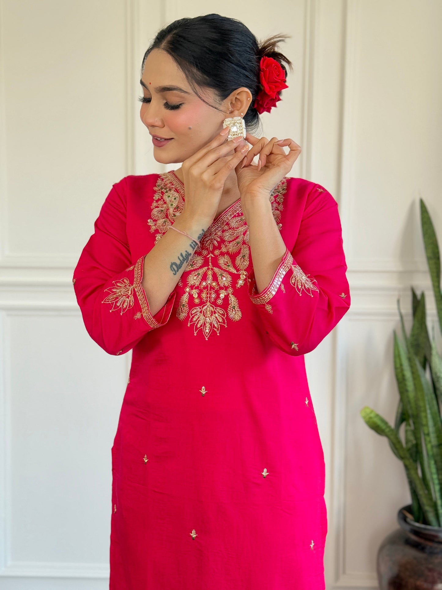 Radiate elegance in this vibrant pink kurti set, featuring exquisite gold embroidery and a beautifully printed floral dupatta