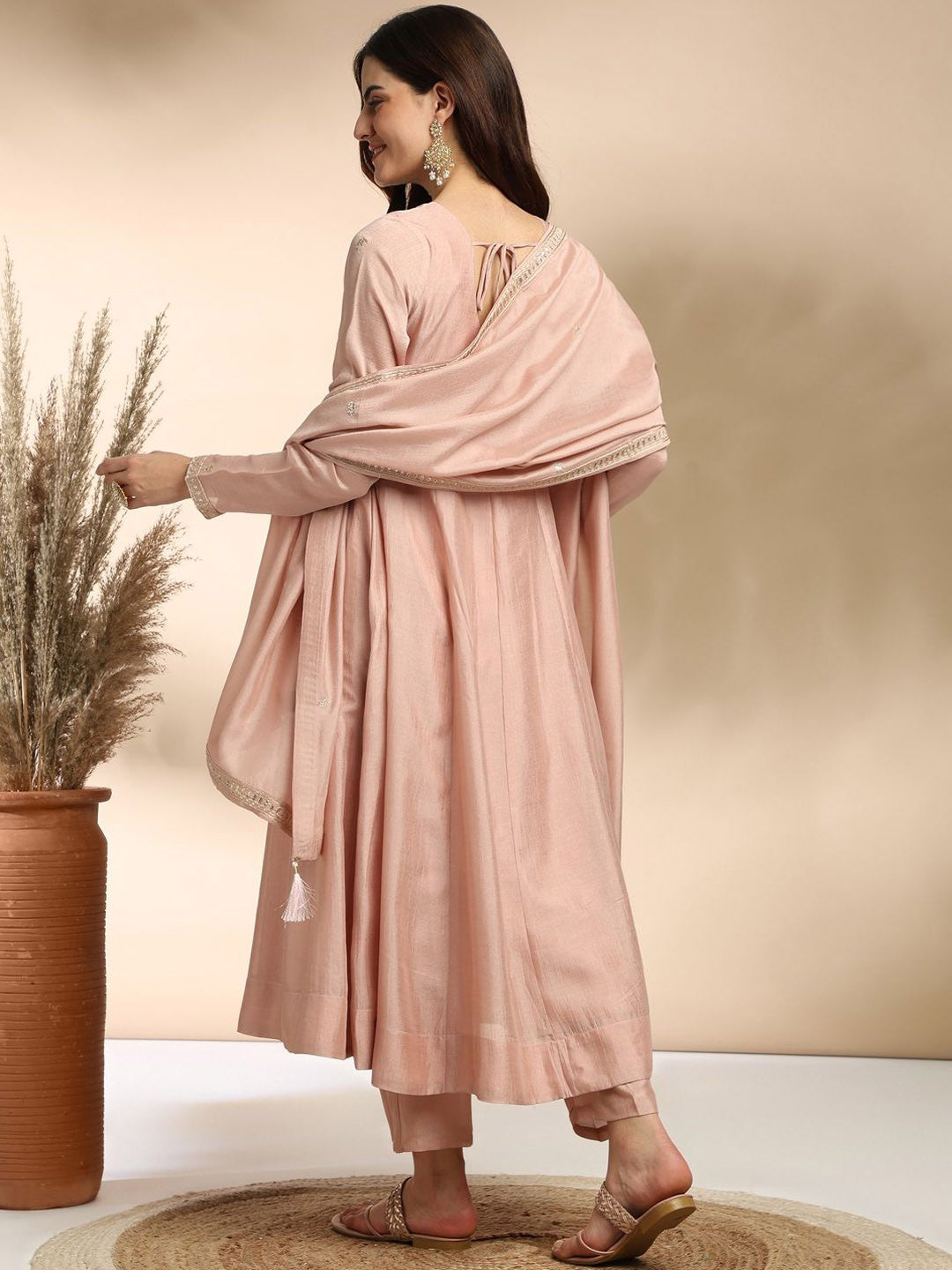 Elevate your wardrobe with this elegant maroon kurti set, adorned with delicate embroidery and a graceful silhouette