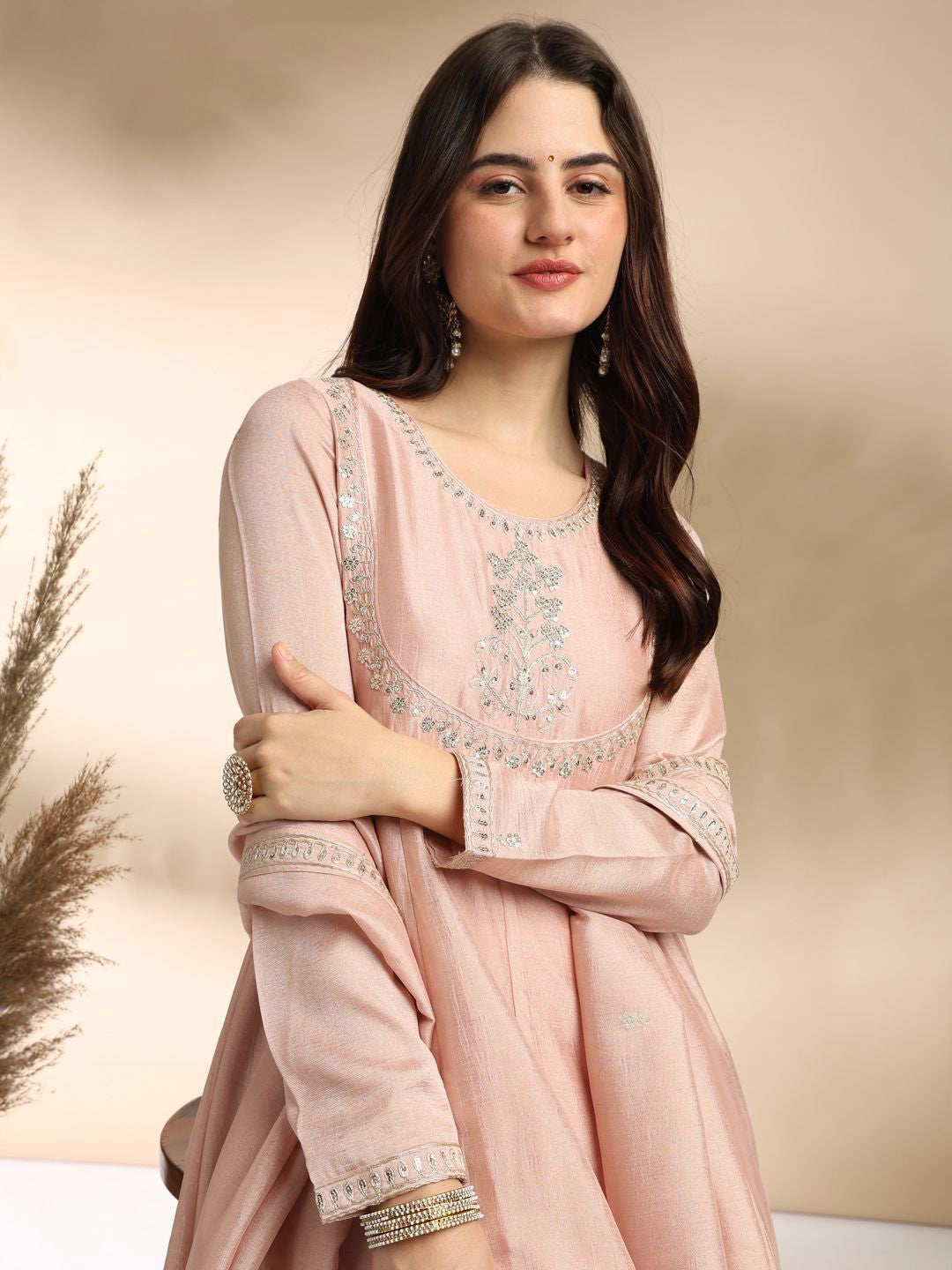 Elevate your wardrobe with this elegant maroon kurti set, adorned with delicate embroidery and a graceful silhouette